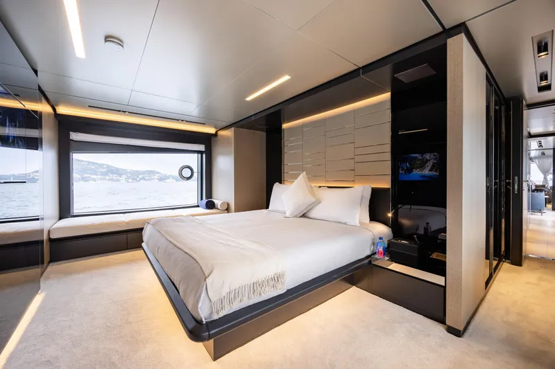 Stile Di Vita Yacht Photos Pics Luxurious bedroom interior of 2023 Riva 102 Super Cosaro yacht with modern design and sea view.