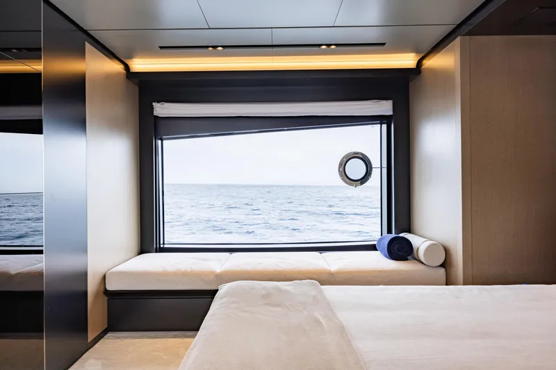 Stile Di Vita Yacht Photos Pics Luxurious cabin interior of 2023 Riva 102 Super Cosaro yacht with ocean view.
