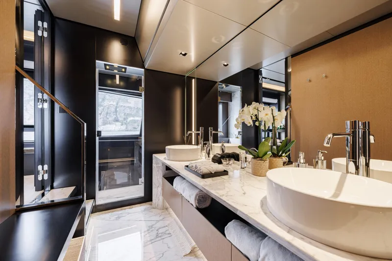 Stile Di Vita Yacht Photos Pics Luxurious bathroom interior on 2023 Riva 102 Super Cosaro yacht, featuring elegant fixtures and decor.