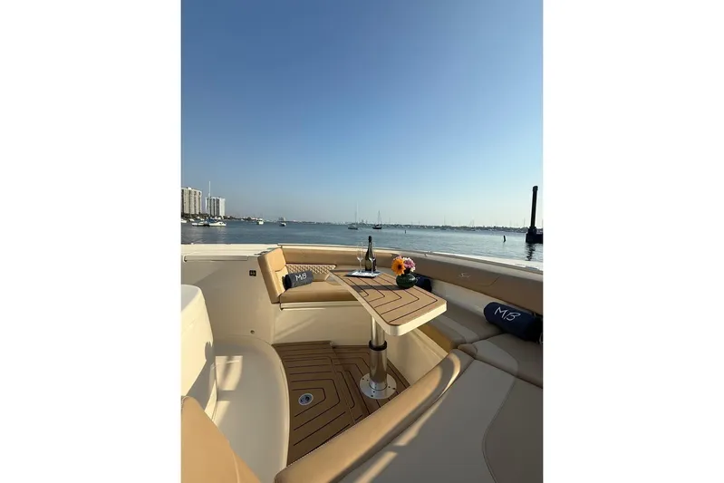 Scout 400lxf Yacht Photos Pics Luxurious 2024 Scout 400 LXF boat interior with elegant seating and scenic waterfront view.
