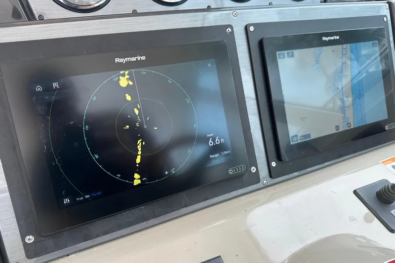  Yacht Photos Pics Raymarine navigation screens on 2008 Sea Ray 48 Sundancer boat dashboard.