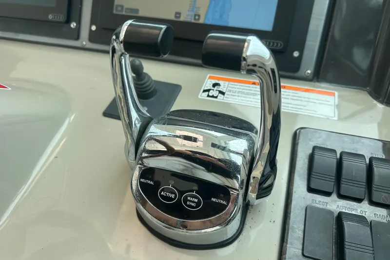  Yacht Photos Pics Control panel of a 2008 Sea Ray 48 Sundancer yacht with throttle levers.