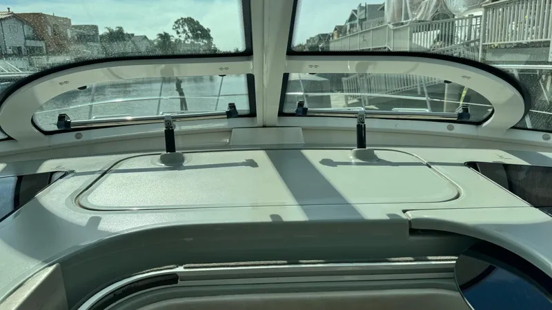  Yacht Photos Pics 2009 Sea Ray 43 Sundancer cockpit with panoramic windows and sleek design.