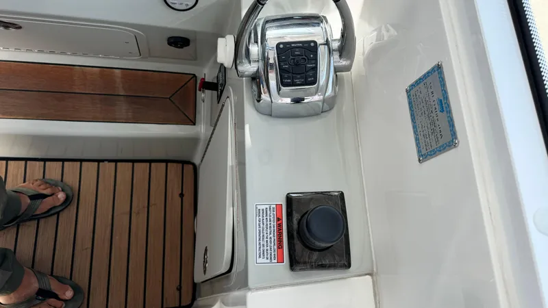  Yacht Photos Pics Control panel of a 2009 Sea Ray 43 Sundancer yacht with wooden flooring.