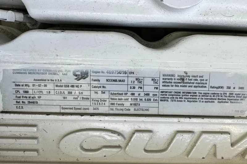  Yacht Photos Pics Engine specifications label on a 2009 Sea Ray 43 Sundancer boat.