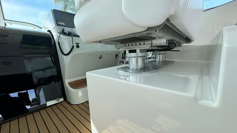  Yacht Photos Pics 2009 Sea Ray 43 Sundancer interior with sleek seating and wooden flooring.