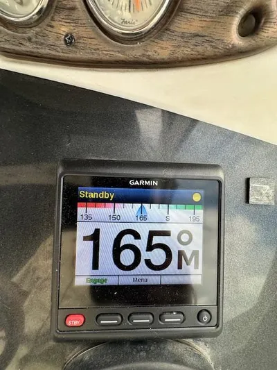 Visionary 21 Yacht Photos Pics Garmin navigation display on 2006 Doral Elegante boat, showing heading of 165 degrees.