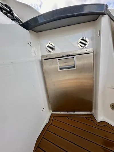 Visionary 21 Yacht Photos Pics 2006 Doral Elegante boat interior with stainless steel appliance and wood flooring.