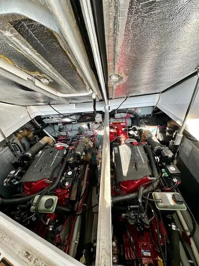 Visionary 21 Yacht Photos Pics Engine compartment of a 2006 Doral Elegante boat, showcasing dual engines.