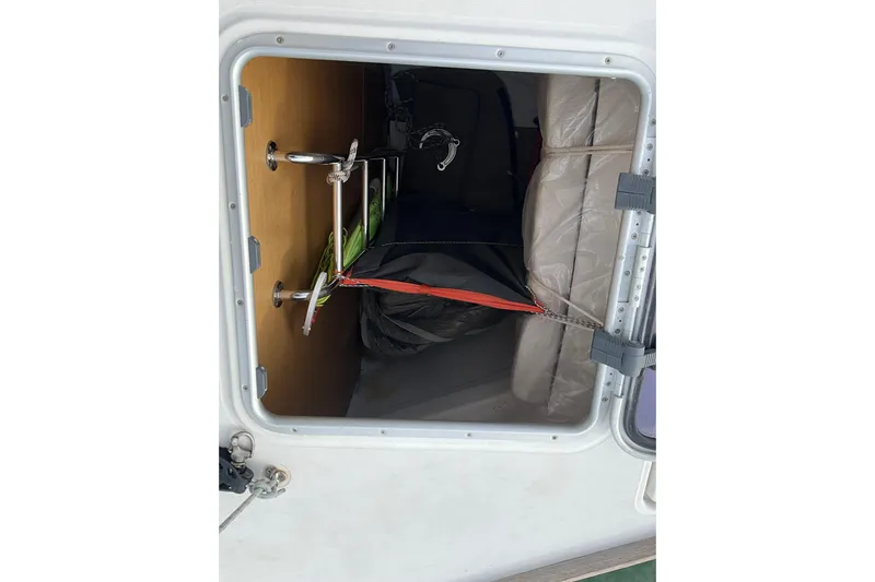 Epicurios Yacht Photos Pics Storage compartment of 2015 Jeanneau Sun Odyssey 469 sailboat, featuring organized equipment.