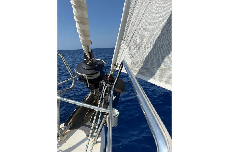 Epicurios Yacht Photos Pics Jeanneau Sun Odyssey 469 sailboat, 2015 model, sailing on clear blue ocean.