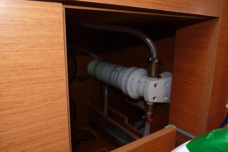 Epicurios Yacht Photos Pics Water filtration system inside 2015 Jeanneau Sun Odyssey 469 yacht cabinet.