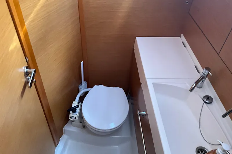 Epicurios Yacht Photos Pics 2015 Jeanneau Sun Odyssey 469 yacht bathroom with toilet and sink.