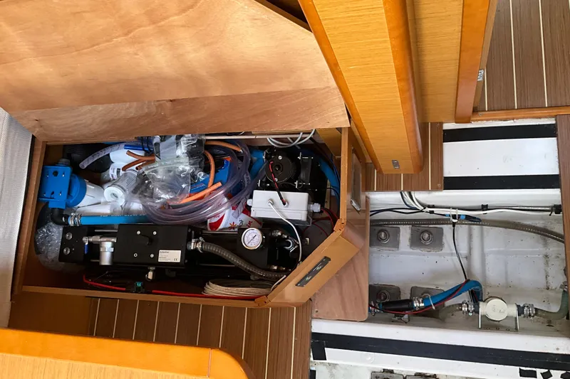 Epicurios Yacht Photos Pics Interior view of 2015 Jeanneau Sun Odyssey 469 yacht showing storage and equipment.