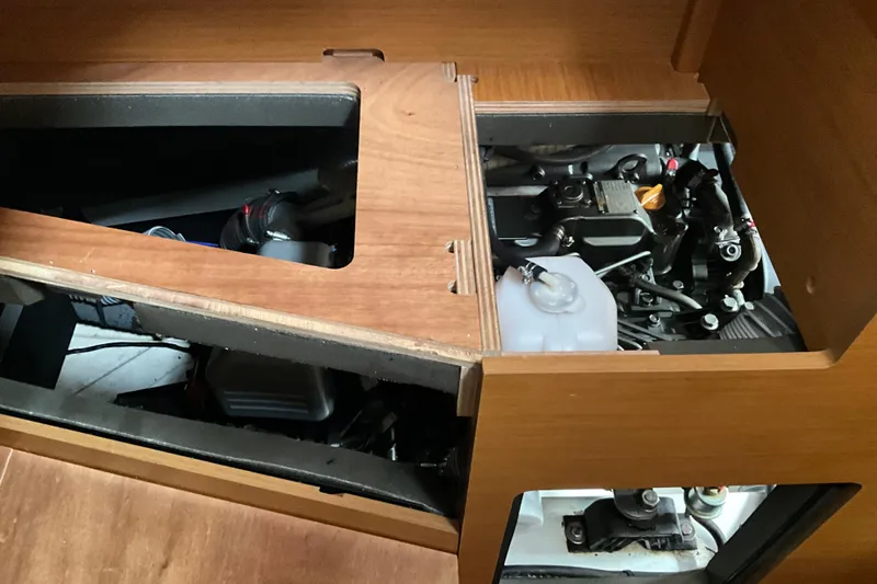 Epicurios Yacht Photos Pics Engine compartment of 2015 Jeanneau Sun Odyssey 469 sailboat, showcasing internal components.
