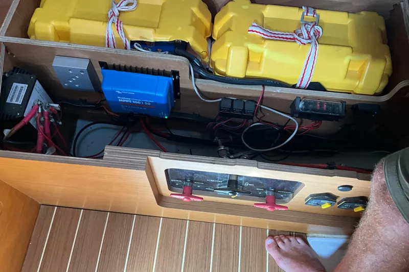 Epicurios Yacht Photos Pics Electrical system of a 2015 Jeanneau Sun Odyssey 469 sailboat, featuring batteries and wiring.