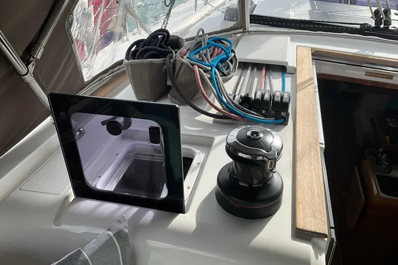 Epicurios Yacht Photos Pics Cockpit of 2015 Jeanneau Sun Odyssey 469 sailboat with winch and ropes.