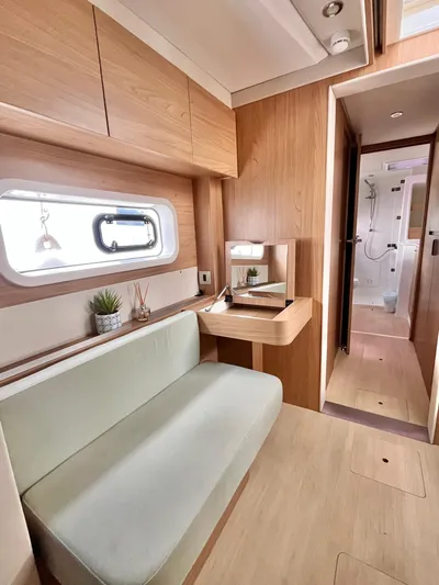 Tropicat Yacht Photos Pics 2024 Bali Catspace 40 interior with modern wood finish and cozy seating area.