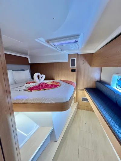 Tropicat Yacht Photos Pics Luxurious cabin interior of 2024 Bali Catspace 40 catamaran with elegant bedding.