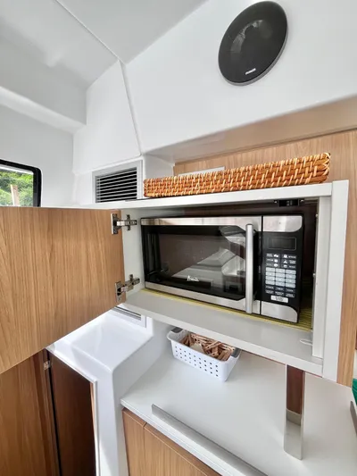 Tropicat Yacht Photos Pics 2024 Bali Catspace 40 yacht kitchen with microwave and storage.