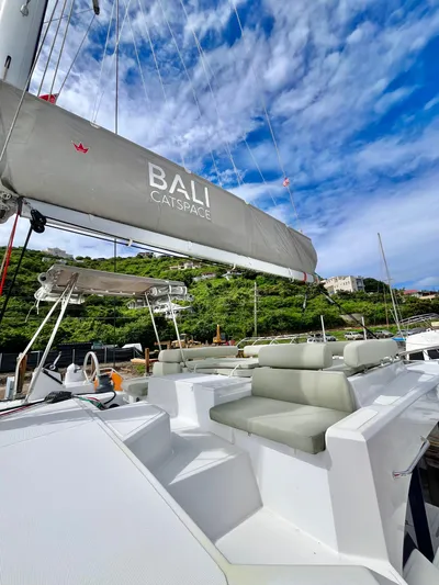 Tropicat Yacht Photos Pics 2024 Bali Catspace 40 catamaran with spacious deck and lush greenery in the background.