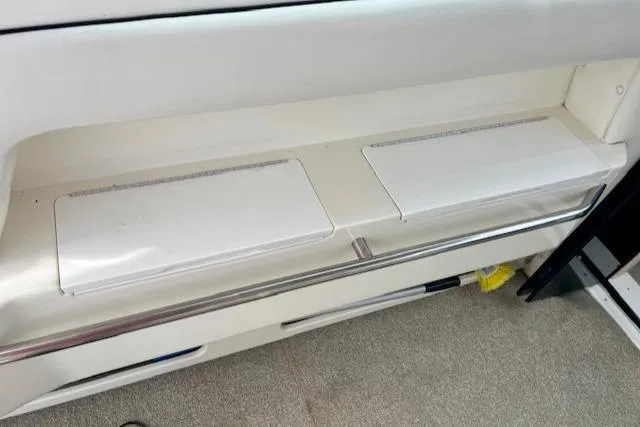 To Come Yacht Photos Pics 1992 Sea Ray Sundancer interior storage compartments and seating area.