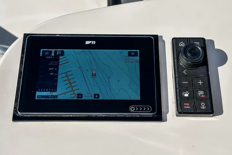 Jesse Girl Yacht Photos Pics Navigation system on a 2005 Carolina Classic 28 boat dashboard.