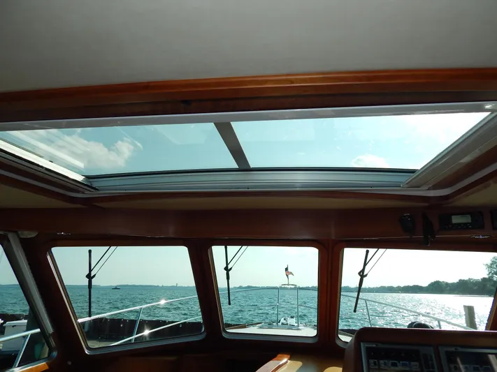  Yacht Photos Pics Interior view of 2010 Sabre 40 Sedan yacht with sunroof and ocean scenery.