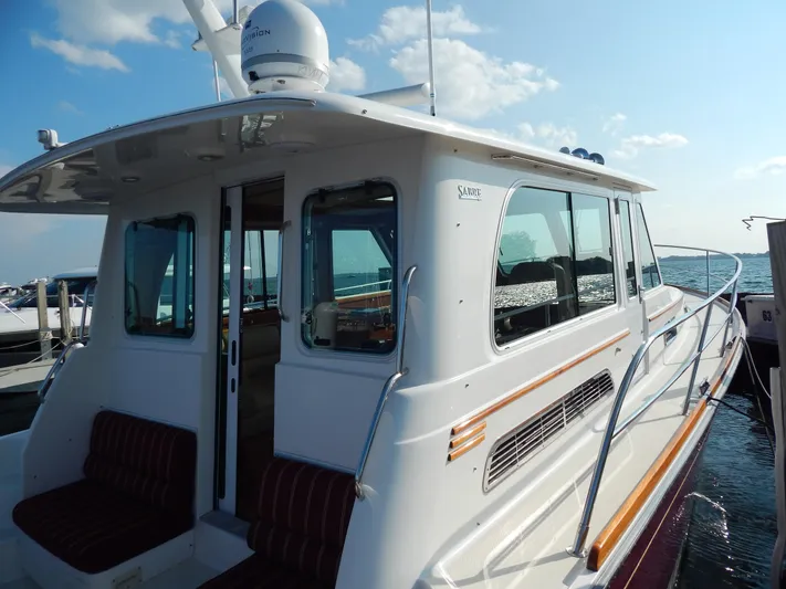  Yacht Photos Pics 2010 Sabre 40 Sedan yacht docked, featuring sleek design and spacious interior.