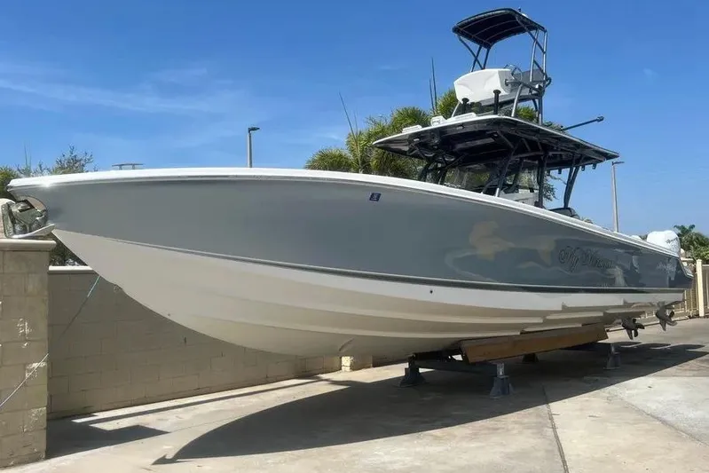  Yacht Photos Pics 2020 Nor-Tech 390 boat on dry dock under clear blue sky.