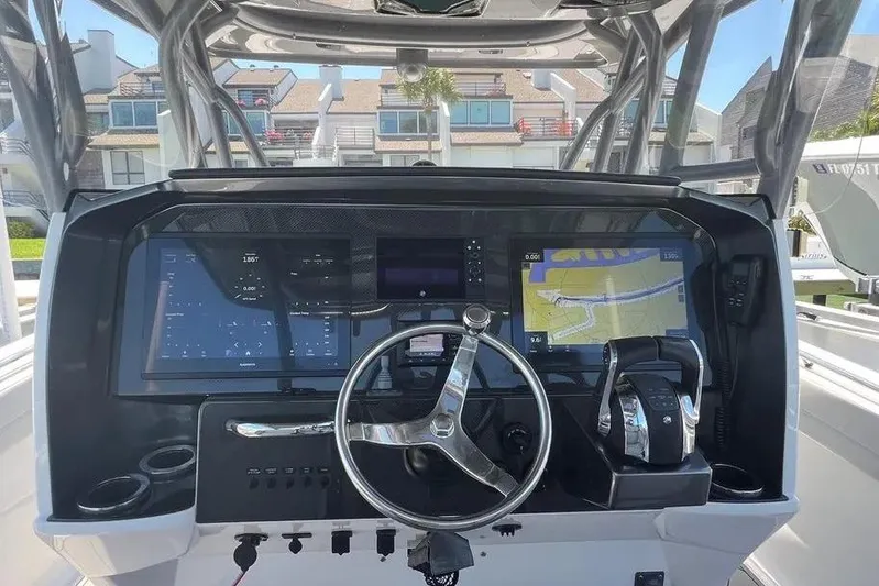  Yacht Photos Pics Cockpit of 2020 Nor-Tech 390 boat with advanced navigation system and controls.