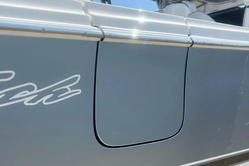  Yacht Photos Pics 2020 Nor-Tech 390 boat side view with sleek design and logo detail.