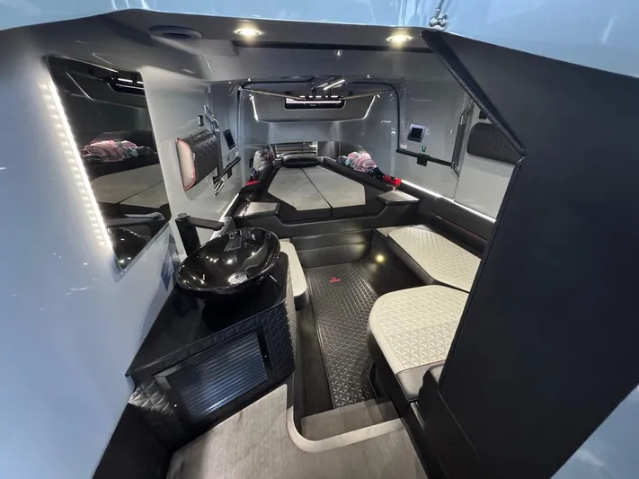  Yacht Photos Pics Luxurious interior of 2022 Axopar Brabus Shadow 900 XC boat cabin.