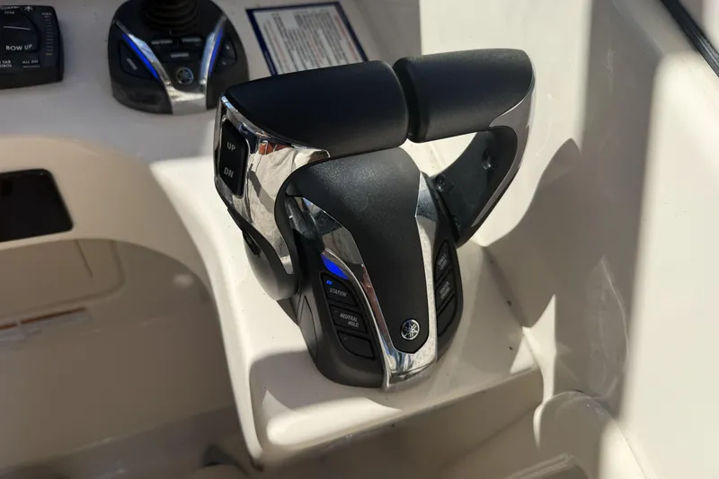 275-264 Brokerage Joe Yacht Photos Pics Throttle controls on 2022 Grady-White Freedom 275 boat dashboard.