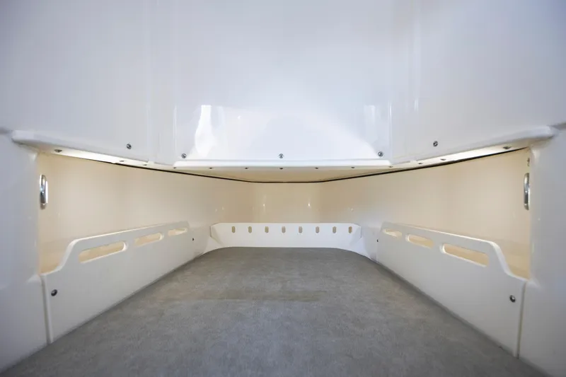 Yacht Photos Pics 2024 Solace 32 CS cabin interior, featuring sleek white design and ample space.