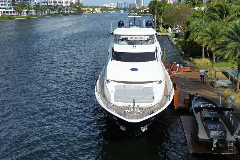 Blue Yacht Photos Pics Luxury Azimut 112 yacht docked by palm trees, 2011 model.