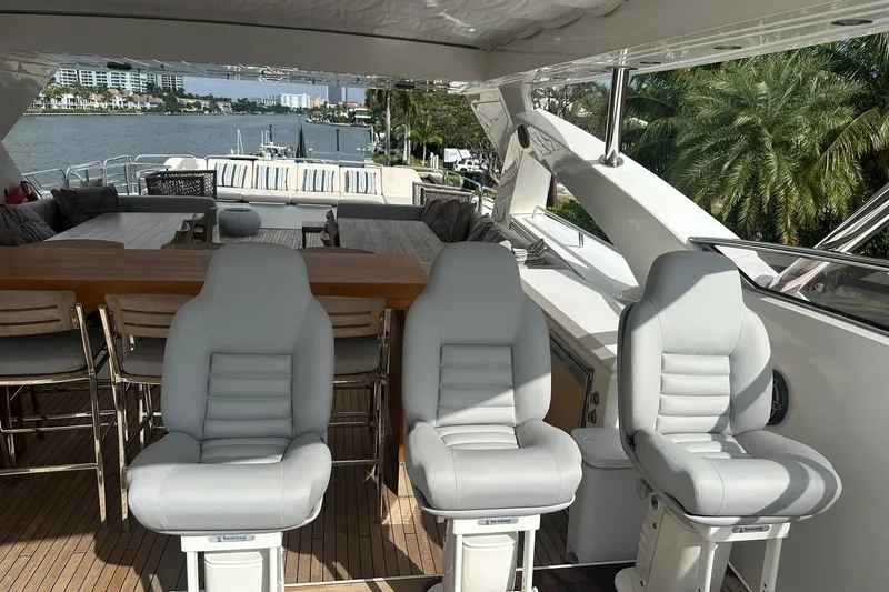 Blue Yacht Photos Pics Luxurious 2011 Azimut 112 yacht interior with plush seating and elegant dining area.