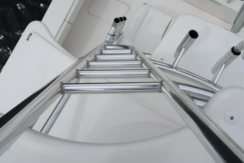 Bad Habit Yacht Photos Pics Ladder and rod holders on 2016 Invincible 42 Open Fisherman boat.