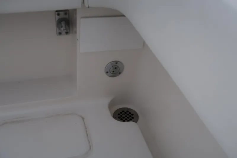 Bad Habit Yacht Photos Pics 2016 Invincible 42 Open Fisherman boat interior detail showing drainage and fittings.