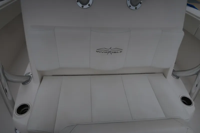 Bad Habit Yacht Photos Pics 2016 Invincible 42 Open Fisherman boat seat with logo.
