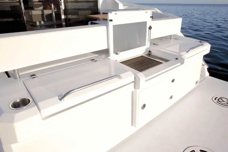Sargam Yacht Photos Pics 2023 Cruisers 42 Cantius yacht deck with sleek white design and ocean view.