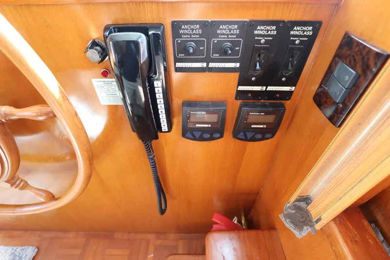 Sea Cow Yacht Photos Pics Control panel on 2005 DeFever 49 Cockpit Motor Yacht with anchor windlass switches.