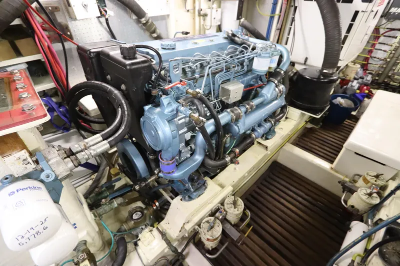 Sea Cow Yacht Photos Pics Engine room of 2005 DeFever 49 Cockpit Motor Yacht with Perkins engine.