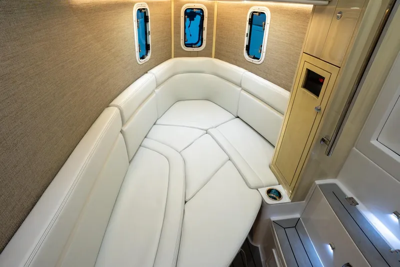  Yacht Photos Pics Luxurious interior of 2024 HCB 42 Lujo boat with plush white seating.