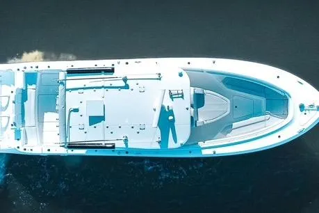  Yacht Photos Pics 2024 HCB 42 Lujo boat, aerial view, cruising on water.