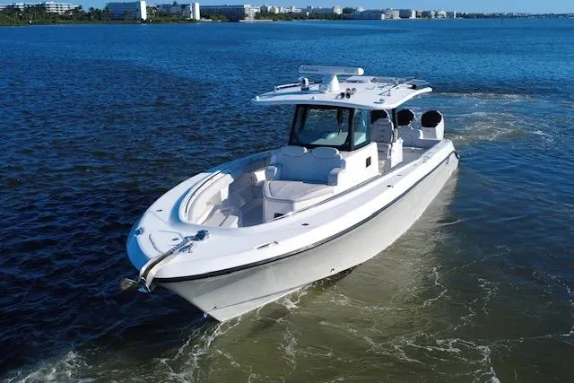  Yacht Photos Pics 2024 HCB 42 Lujo boat cruising on a calm blue sea.