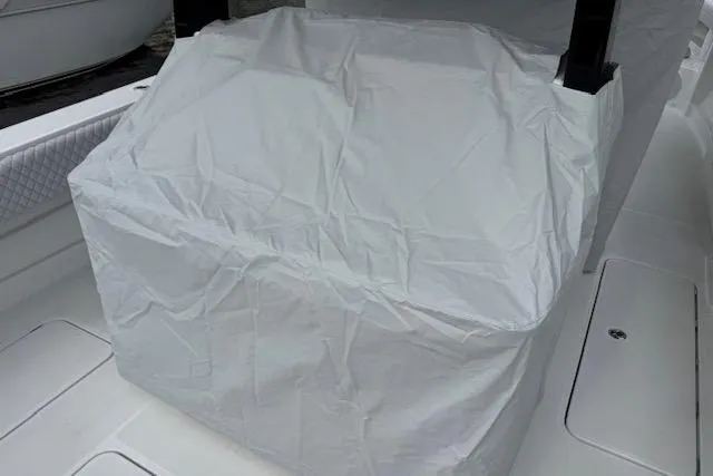  Yacht Photos Pics 2024 HCB 42 Lujo boat with covered seating area on deck.