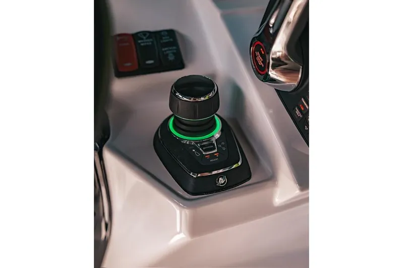  Yacht Photos Pics 2024 HCB 42 Lujo boat control panel with joystick and illuminated buttons.