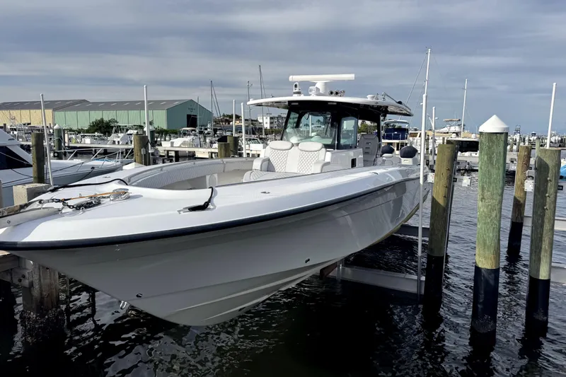  Yacht Photos Pics 2024 HCB 42 Lujo boat docked at marina, showcasing sleek design and modern features.