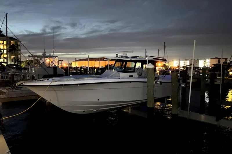  Yacht Photos Pics 2024 HCB 42 Lujo boat docked at marina during twilight.